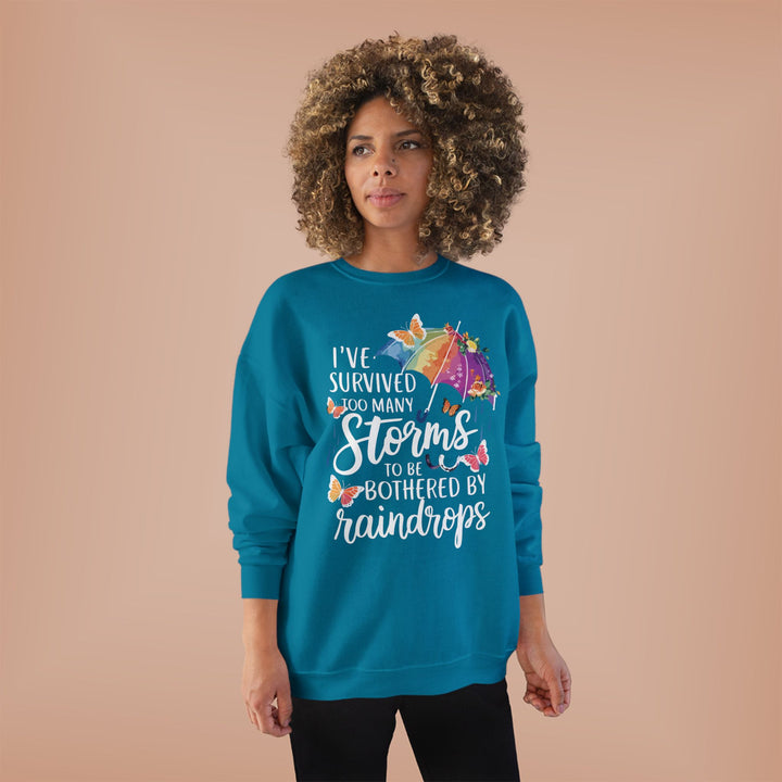 Survived Storms Sweatshirt - Inspirational EcoSmart Crewneck - Beguiling Phenix Boutique