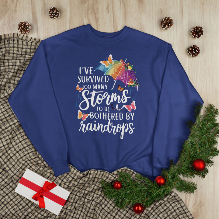 Survived Storms Sweatshirt - Inspirational EcoSmart Crewneck - Beguiling Phenix Boutique